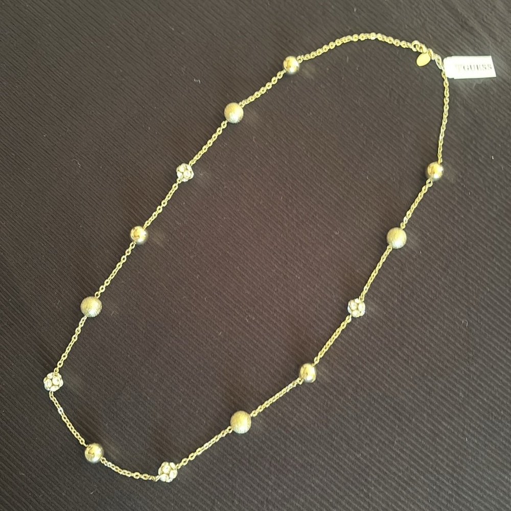 Guess Necklace Gold tone with 3 styles of Beads